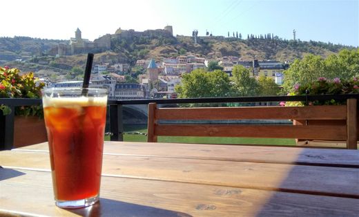 Iced coffee at Borani cafe overlooking the west bank and Narikala citadel.