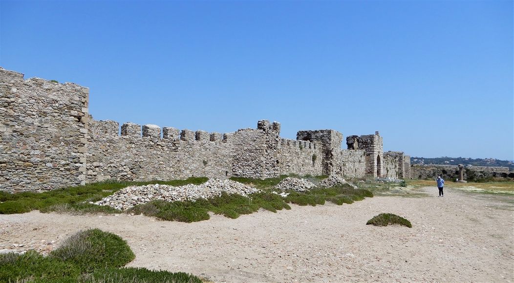 The southern section is divided from the northern precinct by a fortified wall with five towers.