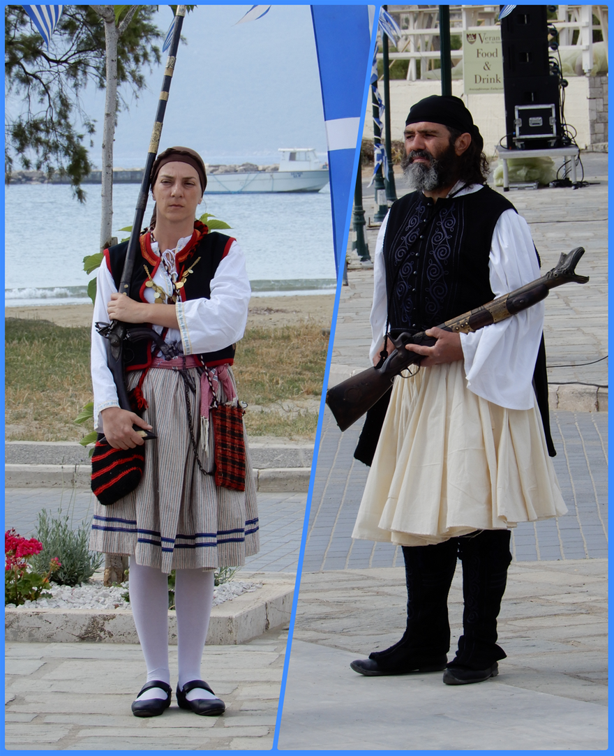 People wear national costumes during the celebrations on the 193rd anniversary of the Naval Battle of Methoni.