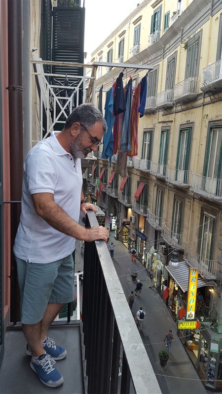 Me at the balcony of my hotel in Via Chiaia.