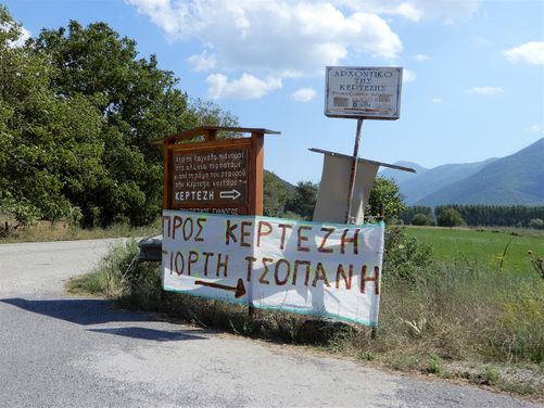 At the beginning of the road to Kertezi village, a sign announces the 