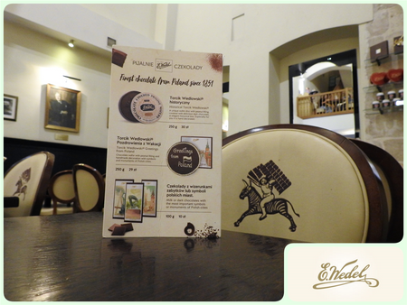 Inside the Wedel Chocolate lounge. The zebra logo on the chair backs and the original logo (bottom right).