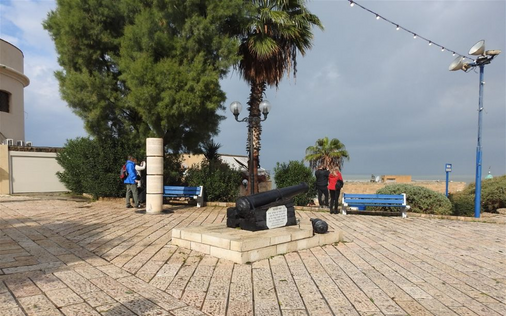 The cast-iron cannon and the monument of the Jewish settlement of Jaffa outside St. Peter's Church.