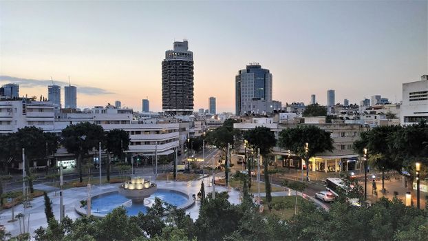 Dizengoff Square in the dawn. The Dizengoff Tower is the barrel-shaped building in the middle of the picture.