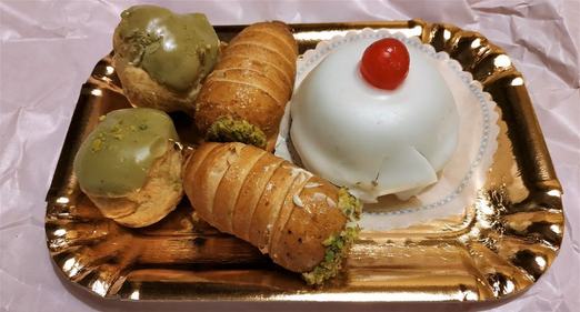 A tray of sweet pistachio treats.