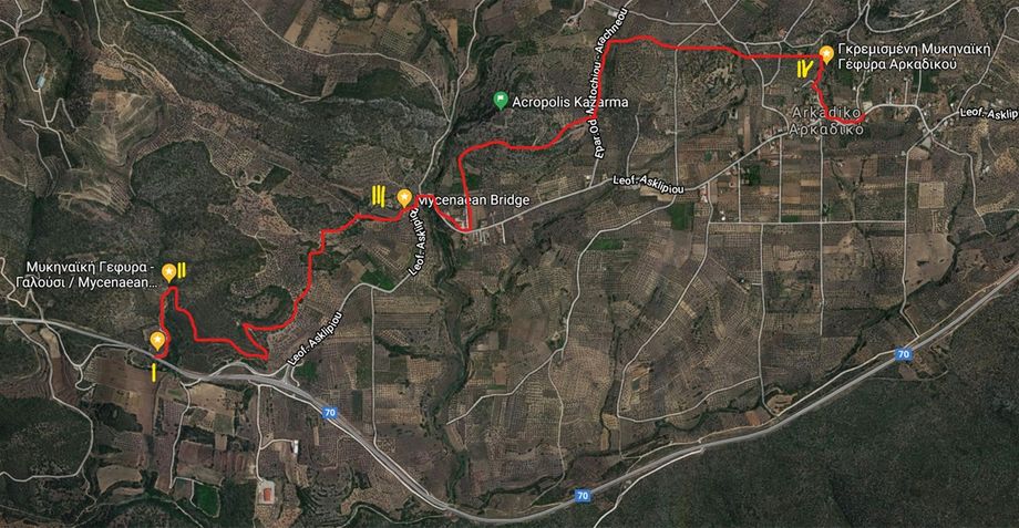 The red line shows the Mycenean Route, a ttrekking trail through history.  The route starts on N70 road (I) and finishes at Arkadiko village. (II) -Galousi Bridge.  (III)-Kazarma Bridge. (IV)- the location of the Arkadikon Bridge, of which only some stones have survived.
