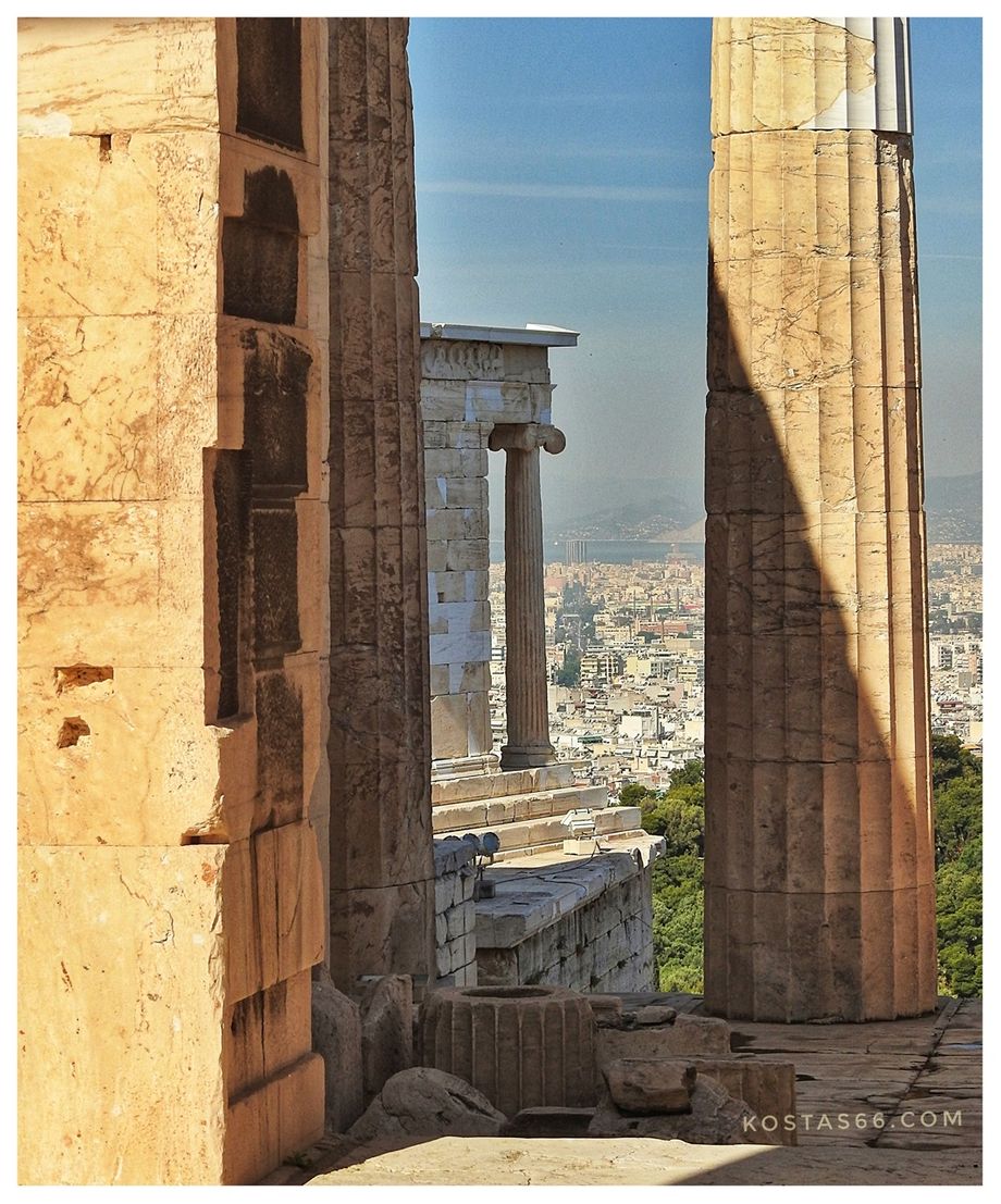 Propylaia columns (in the foreground) and the Temple of Athena Nike (in the background)..