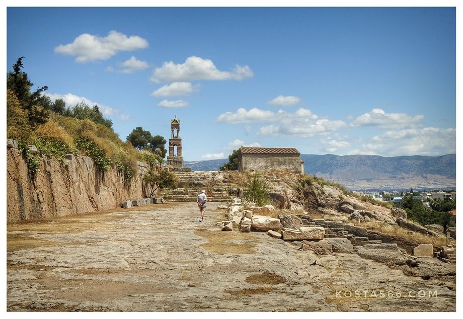 The Rock Terrace.  Panagitsa chapel and the bell tower on the Acropolis.