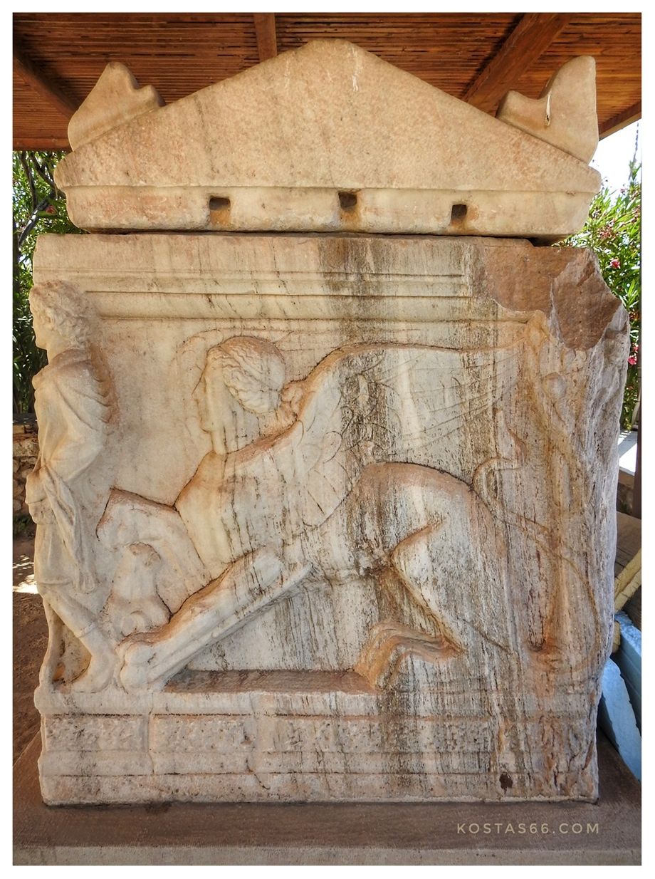 Marble sarcophagus with a relief of a Sphinx on its side face (2nd century AD), in the courtyard of the Archaeological Museum of Eleusis.