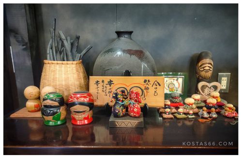 Different kind of Kokeshi dolls as a decoration at a coffee house in Sapporo.