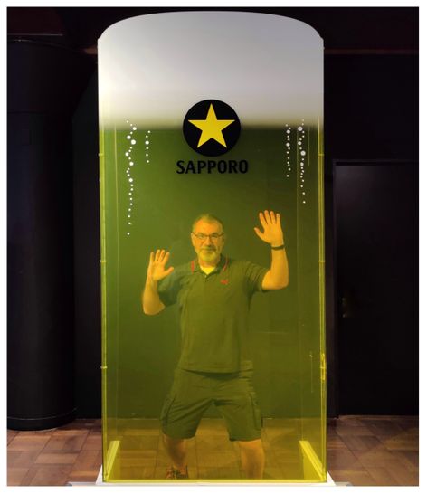 Trapped in a glass of Sapporo beer.