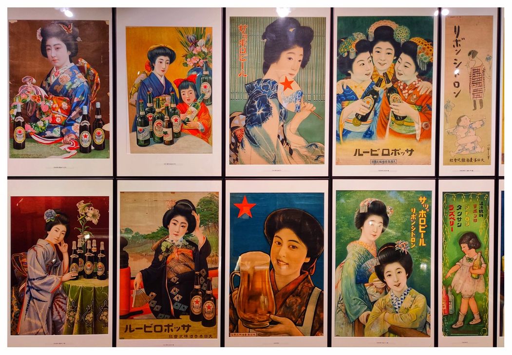 Old Sapporo beer posters at Sapporo beer museum.