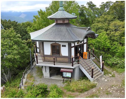 The small Buddhist Temple next to the summit observation deck of Mount Moiwa.