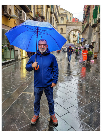 Me at Via Chiaia on a rainy day. Ponte di Chiaia at the background.