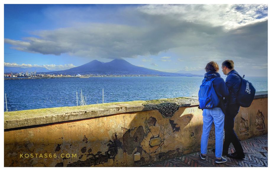 Castel dell' Ovo offers panoramic views. Mount Vesuvius at the background.