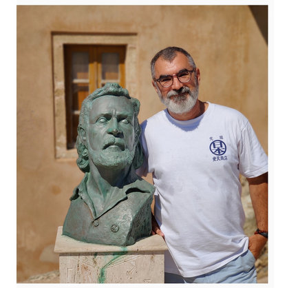 Me with Yannis Ritso's bust outside his house.