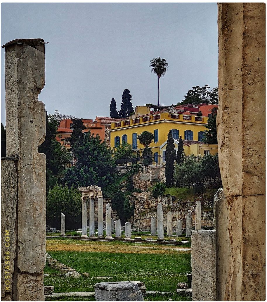 The Roman Agora seen through the columns of the Gate of Athena Archegetis.